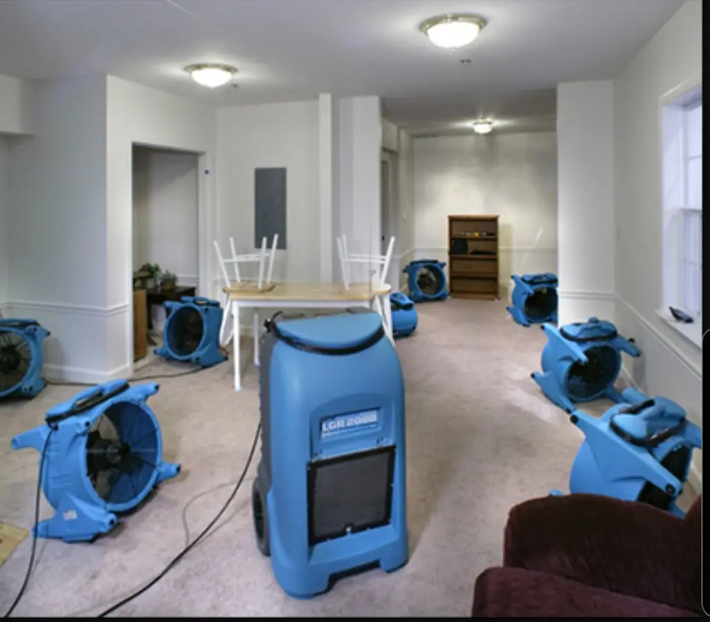 Air movers and dehumidifier setup for Water Damage Restoration in Lake Mills