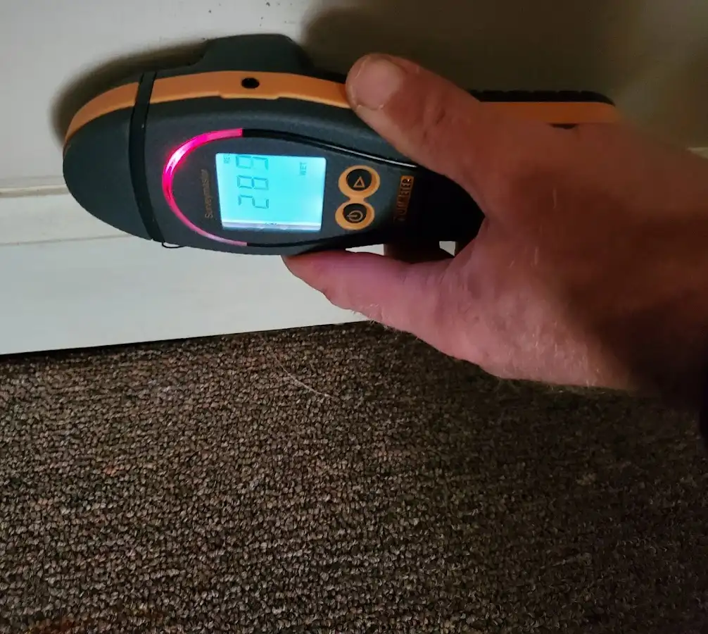 Moisture detection at baseboard during Burst Pipe Cleanup in Lake Mills